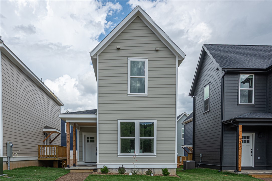 ** MOVE IN READY ** $3,500 LENDER CREDIT offered with buyer’s use of builder’s preferred lender - Use towards rate buydowns or closing costs! (OPEN HOUSES hosted @ MODEL HOME: 1015 N Laramie Heights) Welcome to Southern Woods! A Trailside Community at the base of Centennial Park 2022 Top Outdoor Facility Rating) Location offers access to miles of trails, greenspaces with paved pathways, & bicycle stalls, minutes away to shopping, food, I-49, & University of Arkansas! 3 BEDROOM DUPLE COTTAGE floor plan feat: a covered front porch w cedar posts, an open concept first floor w 9’ ceilings, LVP floors, & kitchen w 3cm granite counters, tiled backsplash, large center island w sink, stainless steel appliances! Main floor laundry, primary bedrm & ensuite! Upstairs 2 more Bedrms w private ensuites! POA $35/mo incl lawn mowing! Join this community in a premier location today!