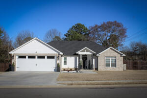 Better than New! Get ready to live your best life in this meticulously maintained 3-bedroom 2-bath home. Entering your new home, you'll step into a split plan that will take you to a spacious living room with a modern built-in entertainment center.  A contemporary dining room with abundance natural light will get you to a kitchen fully equipped with stainless steel appliances, cabinets with above LED lights and quartz countertops. You will fall in love with the master suite that includes a master bath with walk-in closet. More features include home security system, energy efficient LED recessed lights. Smart thermostat, privacy fenced, full gutters, custom blinds and much more. All of this within minutes of downtown Russellville. Now, you've located your DREAM HOME!