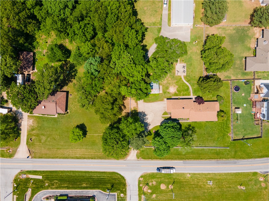 Commercial development potential located adjacent to Beau Terre Office Park within minutes of Downtown Bentonville, Walmart's New Home Office and Crystal Bridges Museum.  Property also includes 3601 E Central Ave.