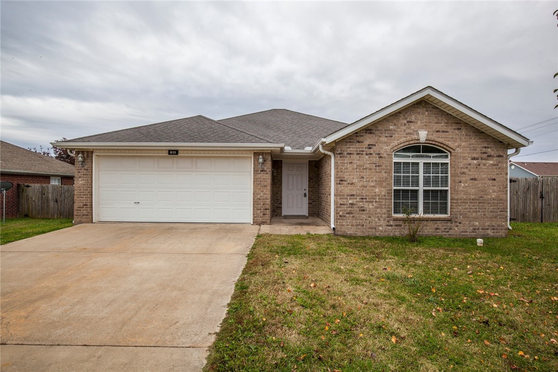 Large corner lot in Centerton. 3 bedroom 2 bath. Living room has tall ceilings and gas fireplace, wood flooring thru main living area, new carpet in bedrooms. Stainless appliances includes microwave and refrigerator. Master bath features double sinks and walk in closet. Fenced back yard with large patio.