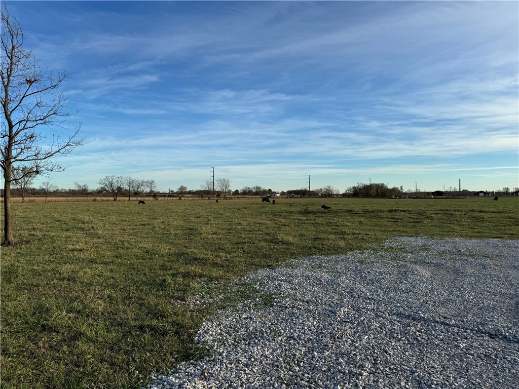 Massive price improvement! Beautiful level property with large pond that was just cleaned out. New fencing , 2 storage buildings.
Huge potential to have a farm or development, not too far from town. No restrictions. Water and electric at the street. Must see! Appointment Only. Cattle on the grounds
