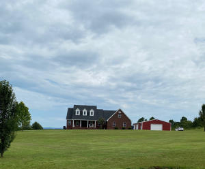 This stately 3bdrm/2 1/2 bath home sits on 3 pristene acres with a beautiful back view of the mountains. The home offers an open floor plan, a spacious 18x18 master bdrm with walkin closet and En Suite. The kitchen features granite & quartz counters, large bar, huge pantry and stainless steel appliances. Other great features include an office, custom maple cabinets throught out, beautiful wood floors, a 846.5 sq ft heat/cooled (new unit) bonus space with 2 large rooms, a large covered front porch, a NEW back heated/cooled sun room with wonderful views! Roof is 1 year with a 30 yr warranty and a 60x40 insulated, heated/cooled garage!  ONLY pre approved buyers, no exception.