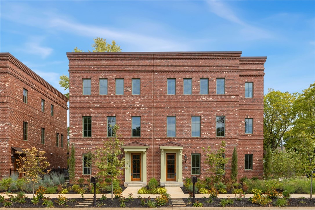 Introducing Park Springs Row! Four luxury townhomes nestled just blocks from the downtown square and lush Park Springs Park! Premier End-Unit features 4BR, 3BA, 1 Half Bath. Ground Level Features Guest Suite or Flex Space, Full bath, and 2 car garage. Second Level features stunning Gourmet Kitchen featuring Wine Room, Walk in Pantry, Marble Countertops, outfitted with Wolf dual fuel range, wall oven, and microwave and built-in Subzero fridge. Large living area with fireplace, Library with built-ins, and powder bath complete the second level. Master Suite with Spa-Like Bath, with 2 more BRS complete the top level. From the copper gutters, gas lantern, and native landscaping outside to the white oak balusters, hidden pantry/wine nook, and wallpapered powder bath inside, you’ll appreciate the thoughtful architectural details and high end finishes throughout. This property is like no other! Simply stunning!