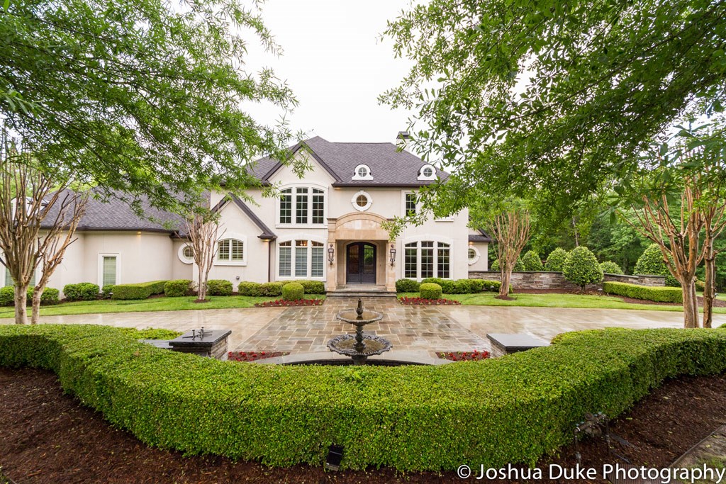One of NWA's finest estates! Few homes can offer the luxury finishes & amenities found throughout this custom home on 3.27 acres (m/l) in the heart of Fayetteville. Gated entry, grand foyer & staircase, study, wine cellar, media room, bonus room & more.,Extraordinary master suite w/marble floors. In-ground pool, hot tub, rolling lawn, pool house w/guest quarters. Smart automation, surveillance cameras, irrigation, extensive landscaping & exterior lighting. Natural creek runs alongside the property.
