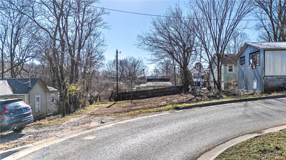 This property is price well below appraised value! Seller has included copies of the recent appraisals. Included are two separate parcels, sold together.  Seller has survey for informational purposes only. Structures have been removed for a clean slate. The property is zoned RMF-24. Located 1 block behind Fayetteville Courthouse and short walk to dining and shopping. Don't miss this opportunity to build a dream home or income producing investment in downtown Fayetteville.