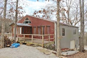 Here's a custom built lakeview home nestled in the woods on 1 acre m/l. Boasting an open kitchen/living/dining room with cathedral ceilings & a full wall of windows overlooking a massive deck with seasonal lake views of Table Rock Lake. Mother-in -law quarters downstairs. 45' x 8' dry storage. Kitchen feautres commercial grade sink, mobile island & pantry. All #'s are approx, sq footage per assessor.