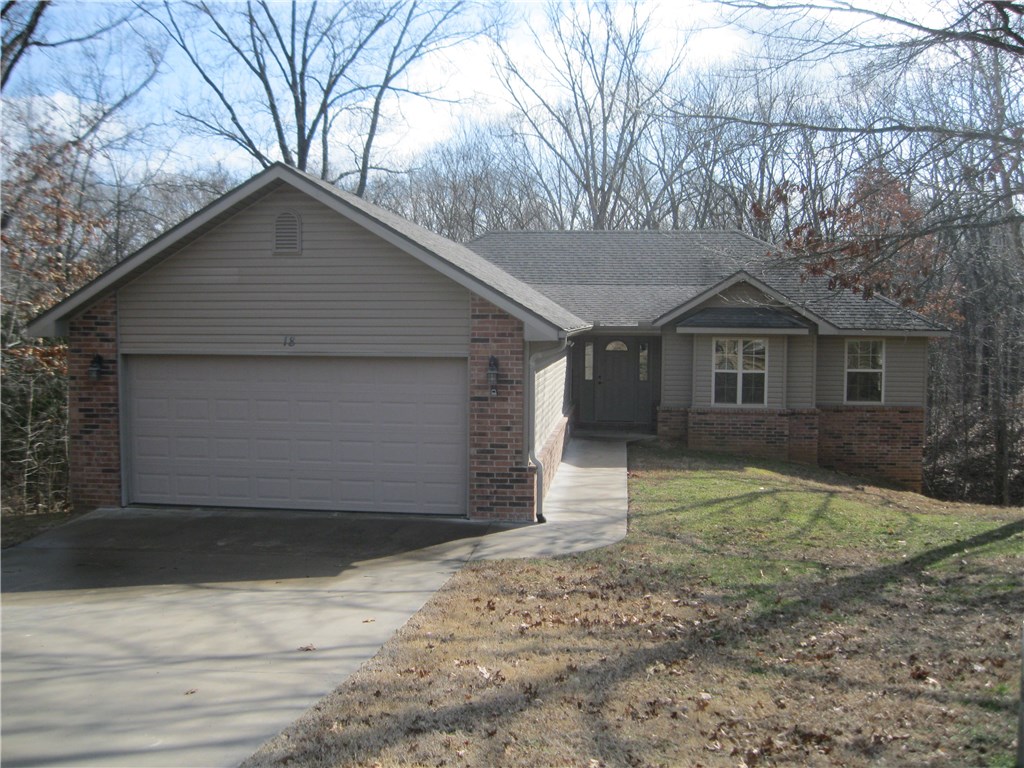 Gorgeous home in the Harrington Subdivision. Features include 3 bedrooms, 2 full baths. Open floor plan with abundant natural lighting. Huge Master bedroom with Jacuzzi tub and walk in shower. Gas log fireplace in living area. Enjoy the privacy off the back deck overlooking wooded area.