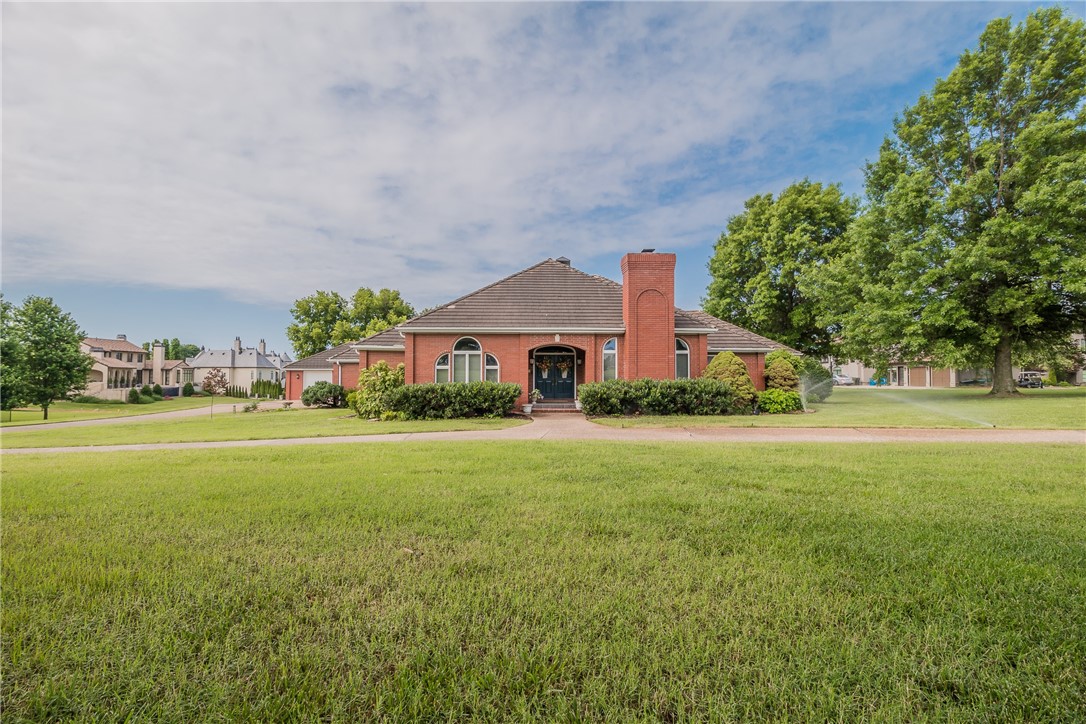 Take advantage of a rare opportunity to own one of the biggest lots in all of Pinnacle Country Club on prestigious Pinnacle Drive overlooking the 17th green. This 1 level home features an open floor plan with 3 bedrooms, 3.5 bathrooms and 3 car garage with workshop space! Large Living Room with built-ins, fireplace and access to sunroom with wall of windows with impressive views of the golf course. Updated eat-in Kitchen with island and bar, spacious Dining Room and second Living Room/Library with stone fireplace.  Master suite with large bathroom and dual Master Closets with access to patio and golf course. The outdoor space is completely private and perfect for entertaining, complete with covered patio, large flat backyard and expansive golf course view.