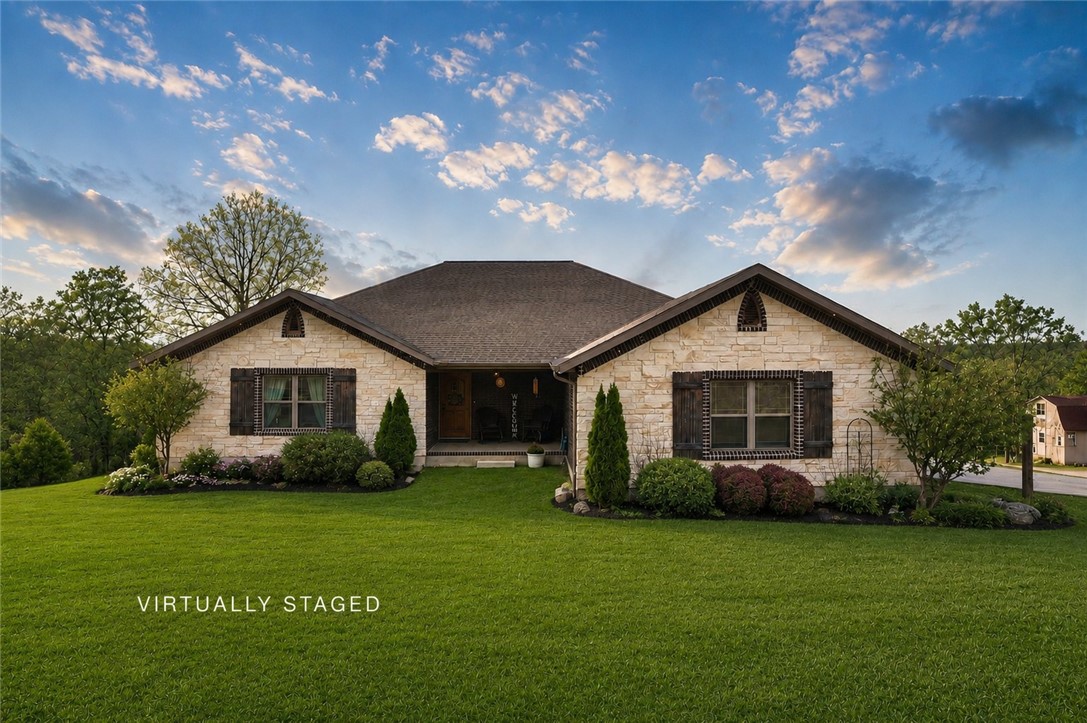 Set on 5 private acres, this Huntsville retreat offers the perfect blend of comfort, flexibility, and peaceful living. The main home (3,492 sqft) features 5 bedrooms and 3.5 baths with an open, inviting layout designed for both everyday living and entertaining. The expansive back deck is a true highlight, overlooking serene wooded views that create a private escape right at home.

The finished walk-out basement adds incredible versatility with a storm shelter and a large open space ideal for gatherings, hobbies, a game room, or extended stays. A detached guest house (464 sqft) expands the possibilities even further with its own kitchen, loft bedroom, and full bath—perfect for guests, multi-generational living, a private office, or income potential.

Thoughtfully designed and surrounded by nature, this property delivers the privacy and lifestyle you’ve been searching for while still being just minutes from town. Google Maps location is not accurate. Preferred lender offering $3,500 credit.