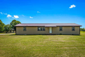 Come check out this nicely maintained 4 Bedroom 2 Bathroom home just outside of town. It sits on almost 2 acres providing a great space for privacy. This house features a metal roof, updated flooring, new paint, and an attached garage that includes a nice room with shelves for canning or extra storage. Also on the property is an exterior building with plumbing and electric. Conveniently located 10 minutes from Harrison & only 20 minutes to Branson, MO