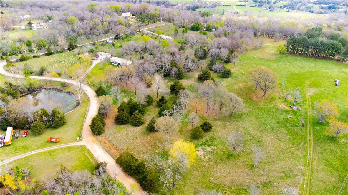 THIS IS TRULY A RARE FIND! Stunning 5.39 acres of meticulously maintained land between Elkins and Goshen. The terrain slopes gently and has multiple, beautiful sites to build an amazing home. This is the perfect spot for your dream home! The property features a small pond. Book your showing right now and see this for yourself!
