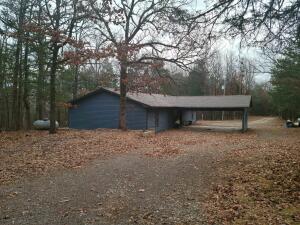 Ridgetop home in a wooded setting.  This home offers 3-bedrooms 2 bathrooms, recently remodeled, new roof, shop, 2 car attached carport and so much more. Sitting on 10 acres this home is a rare find. There is another home that joins this property that offers 2 bedrooms, and 1.5 bathrooms that is also for sale and sits on 1 acre. Combine the two for a perfect two-family homestead or live in one and Air B&B the other.