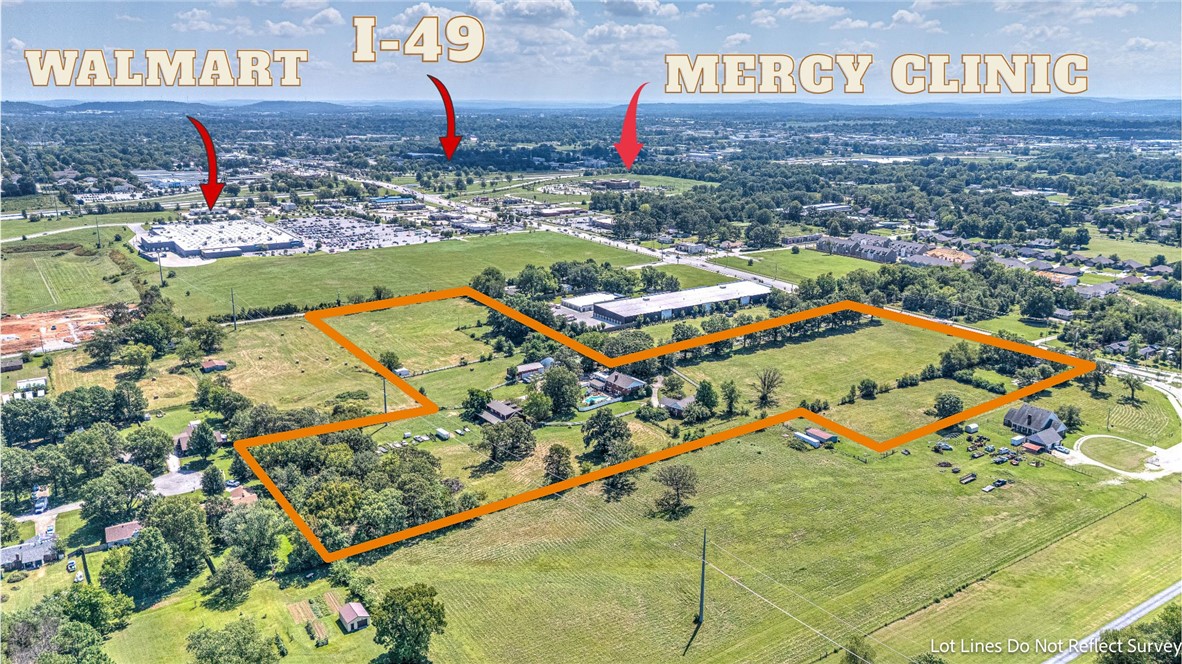 This remarkable 18-acre property offers exceptional commercial potential in a prime and growing corridor of Springdale. With expansive open fields, excellent visibility, and direct access from the roadway, this tract is well-suited for a variety of development opportunities. The land features wide, gently rolling acreage with a mix of open grassland and tree-lined edges, providing both versatility and natural appeal. With the property’s strong road frontage, multiple clear sightlines, and the depth of the parcel, highlighting how well it can accommodate large-scale commercial use. The setting combines ease of access with high visibility, making it ideal for retail, mixed-use, or professional developments. Surrounded by continued growth and positioned in a highly desirable area, this property provides both immediate utility and long-term investment value. Whether for a major commercial project or phased development, this 18-acre tract stands out as a rare opportunity in the expanding Springdale market