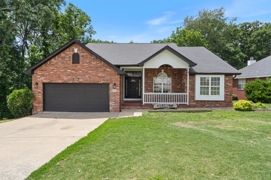 RARE opportunity to own the only triple-lot property in the neighborhood, offering an exceptional 1.03 acres in the heart of Bentonville! This 4-bedroom, 3-bath home is ideally located just minutes from Downtown Bentonville and adjacent to the world-class Coler Mountain Bike Preserve, providing the perfect blend of convenience, outdoor adventure, and privacy. Recent updates include a new outdoor unit A/C unit (2026), fresh kitchen paint and refreshed cabinetry, a newer roof (2019), and an updated fireplace with beautiful tile surround (2021). The climate-controlled garage adds year-round functionality, while the backyard storage shed offers additional space for bikes, tools, and outdoor equipment. With a rare amount of land in a highly sought-after location, this property presents endless possibilities as a primary residence or investment opportunity. Enjoy the space you want with the proximity to everything Bentonville has to offer.