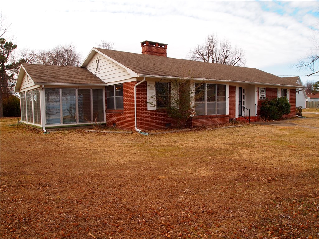 A hidden gem in central Springdale.  Huge .71 acre corner lot.  Home has a ton of character!  Soaring HW floors, gas log f/p, covered patio with built in outdoor grill.  240 SF sunroom that is not included in the square footage.  House has several unique built-ins.  Still dated in some areas but priced accordingly.  Less than 1 block from Westwood Elementary and 5 blocks to Springdale High.  Seller currently not considering FHA financed offers.