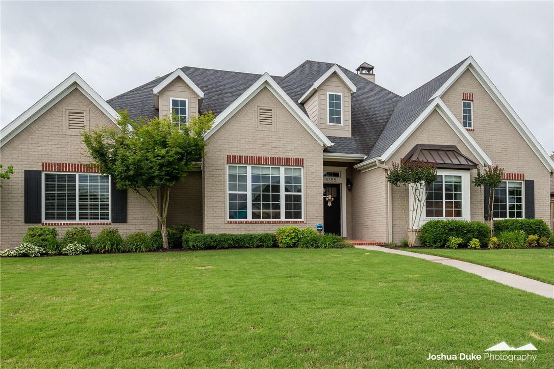Rare find in Fayetteville! This light and bright beauty is turn key ready. 4 beds, 3 1/2 baths, separate office and bonus room upstairs with its own full bathroom. Upgrades and custom finishes throughout the home, including plantation shutters, built-ins, granite countertops and a stunning island. This home sits on a corner lot within walking distance to Rodney Ryan Park. Golf course community includes a clubhouse and golf course ranked #1 public course in Arkansas.