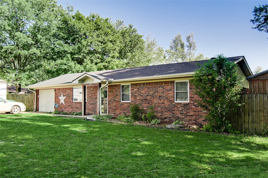Charming 3 bedroom single-family home in a convenient Farmington location! Situated just minutes from local schools, shopping, and the city park, this property offers both comfort and accessibility. The large open lot provides plenty of space for a future garden or outdoor activities. Inside, you’ll find new wood-look tile flooring, along with a roof that was replaced in 2023. Outside, enjoy the covered back patio with framing already in place for your dream outdoor kitchen or grilling area — perfect for entertaining. The property also features a 12x24 detached shop, offering great space for storage, hobbies, or a workshop. Faux fireplace does not convey. Kitchen refrigerator and outdoor patio furniture to convey. Please allow 2 hour notice before showings