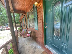 3 possibly 4 bedroom home on over an acre with several out buildings and large back deck with total privacy in the backyard!