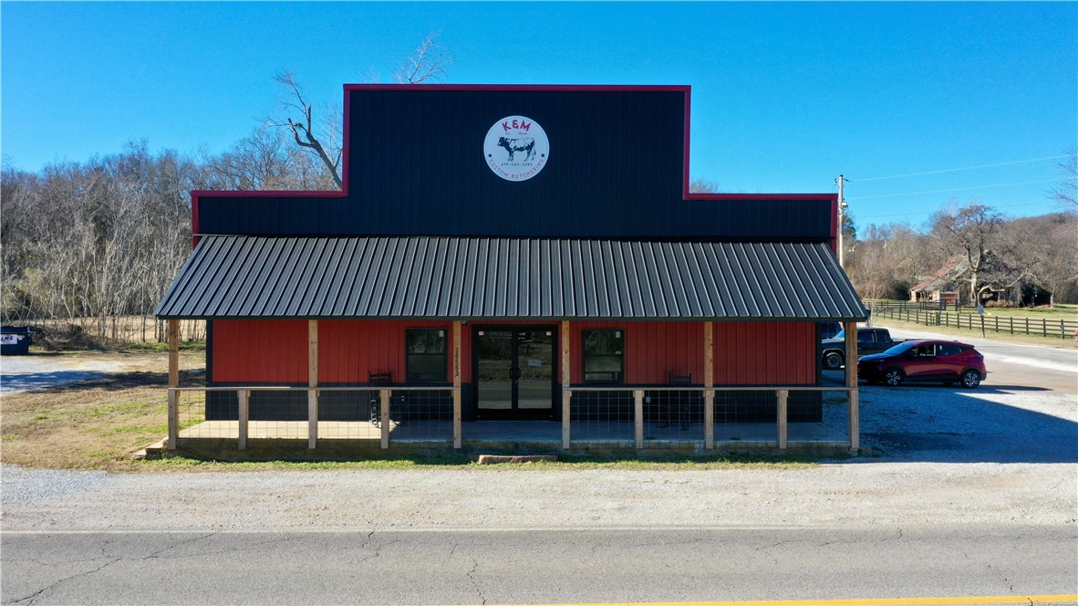 Located only 20 minutes from Fayetteville and right outside of Elkins, this property is currently a turnkey butcher shop with new stainless-steel tables, band saw, commercial grinder and vacuum sealer a 12 X 24 cooling room and a 12  X 24 freezer, holding pens, and a kill shoot which all convey. With two 200 AMP Services with 3 Phase Power this property has the potential to be whatever you need in a commercial build at a great price. A daycare, a venue, an automotive shop, a store, a restaurant....the choice is yours. In its past life, it was a very successful store.  With a small-town feel and close to the White River and all things outdoors, this location is the best of both worlds with its convenient proximity to town. Extensive remodeling of this 4100 sq ft climate-controlled building on Hwy 16 road frontage makes this highly visible in a rapidly growing area of NWA. Call today to schedule your own private tour and start building your financial future.