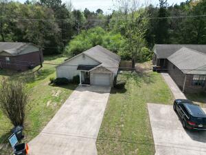 Open living floor plan 3 bedroom/2 bathroom home with privacy fenced backyard. 1 car  ducted garage was enclosed, creating a large living, dining area, which has a vaulted ceiling. Square footage is estimated from tax record. It is only minutes to I-40 and Arkansas Tech University.