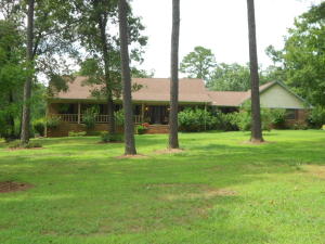 Wonderful Custom Built home where attention to detail has not forgotten!Immaculate landscaping with terrific backyard, Huge Deck, Firepit, Hot Tub, Garden area, and Privacy fenced sodded lawn! This may be the prettiest backyard on the market! Well cared for inside too with large great room! Fireplace is ducted to workshop area off garage and is included in heated area.3 large bedrooms plus office