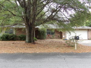 This picture perfect house is a must see for any buyers looking for a home in a quaint neighborhood with a spacious backyard. With fresh paint on the walls and trim, this 3 bedroom, 2 bathroom house is move in ready so you'll be cozying up by the fireplace all winter. Storage building, fenced yard, ceramic tile & covered patio and many more extra features make this home a STAND OUT.