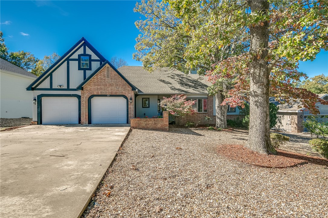 Warm & inviting home on a roomy 1/2 acre lot with beautiful mature trees. This house has so much potential & has excellent "bones." Tall ceilings in dining & living rooms - wonderful split floor plan. Wet bar with cabinets & sink. Master has walk-in closets & separate tub/shower in bath. Lots of storage & built-ins. Relax on the huge deck & enjoy nature. Storage shed conveys. Home has been approved for sewer line & the seller is offering to pay for half of the hookup cost! You've got to see this home!