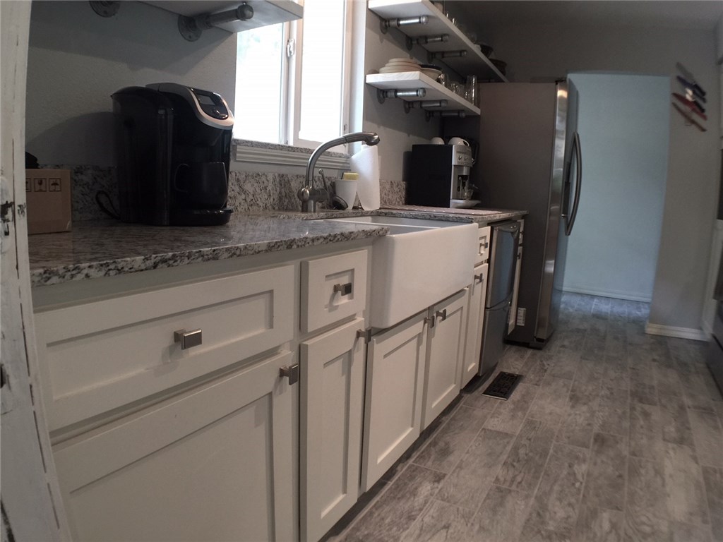 Quality updated home! Fantastic outdoor entertaining space with two brand-new level decks and new hot tub! All new windows, doors, appliances, fixtures, floors, baths, deck, kitchen, too much to mention! Some items still in progress to be finished.