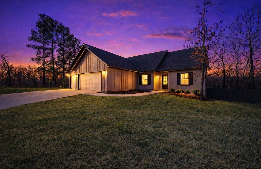 $15k SELLER CONCESSION! Buy down your rate, use for closing costs, the sky is the limit!!! Brand new & tucked onto a rare & flat .34-acre lot! Room for dogs to run, kids to play or evenings spent under the stars with friends gathered around.
Inside, natural light fills the open-concept living space where the kitchen, dining, and living areas connect seamlessly — designed for hosting holidays, game nights, or slow mornings with coffee. A hidden pantry keeps everything beautifully organized, while a dedicated office creates the perfect work-from-home setup without sacrificing entertaining space.
Just off the garage, a true mudroom keeps backpacks, shoes, and daily life contained. The coveted 3-car garage offers space for vehicles, lake toys, bikes, and storage. Fence, gutters & blinds included! 
All just steps from Branchwood Rec Center & nature trail. Flat lots are hard to find in Bella Vista — and this one is ready to welcome you home! Ask about our preferred lender offering up to 1% of loan!