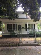 Historic Home has lots of charm from the front porch to the towering magnolia tree in the front. A screened back porch with swing to enjoy a good book or morning newspaper. Large rooms with tall ceilings and hardwood under the carpet.