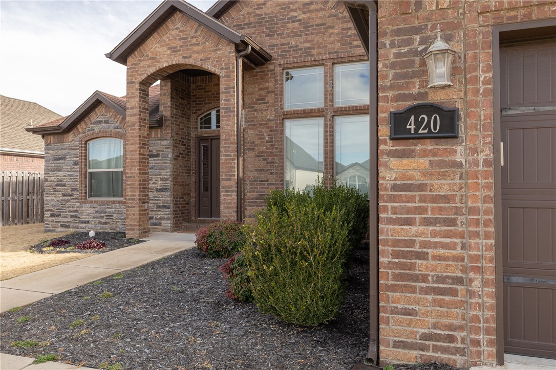 The perfect entertaining home in the desirable Legacy Pointe Subdivision minutes from shopping, restaurants, parks, and the U of A! Come tour this spacious, split 3 bedroom, 2 bathroom home with tall ceilings, warm colors, wood-look tile, and gas log fireplace. Kitchen features granite countertops, tiled backsplash, separate gas cooktop and wall oven. Formal dining and eat-in kitchen for plenty of room for guests. Relax in the large primary with tray ceilings, crown molding detail, double sink vanity, 2 walk-in closets, jacuzzi tub, and tiled walk-in shower. Extra large laundry room with cabinets and bult-in drop zone.
Don't miss the covered back patio with built-in fire pit in the fully privacy fenced back yard.