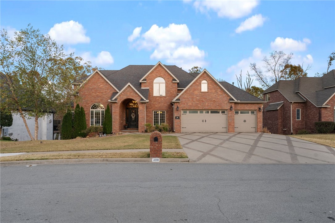 Experience elevated living in this sleek 6-bedroom, 4.5-bathroom home, perfectly situated moments from downtown Bentonville, and next to the scenic Coler Creek Trailhead. Spend mornings on the trails and afternoons poolside in this home designed with a modern lifestyle in mind. This home features dual living rooms, a workout room, multiple bonus spaces, an office, a wet bar, and a private theater for ultimate entertainment. Step outside to a private in-ground saltwater pool, expansive decks, and a stylish fire pit area, creating an outdoor oasis for gatherings or quiet evenings. With generous walk-in closets and well thought out storage throughout, this home balances elegance with everyday ease. Recent updates include a new roof, new liner for the pool, and new garage openers for the 3 car insulated garage doors. Make this Bentonville gem your own and live the lifestyle you've been envisioning—schedule a private showing today.