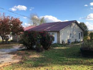 Nice 2-3 bedroom house with extra large lot and two out buildings that could be used as a shop and storage; a lot of home for a little price