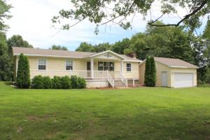 You will love the country setting & large near level yard with this 2 bedroom 11/2 bath home on 1.02 acres m/l. Detached 2 car garage, 2 storage sheds, rock fireplace with gas log insert, all located on the edge of town. All #'s are approx., age & sq. footage per assessor, buyer to verify existence of septic. This is a Fannie Mae HomePath property.