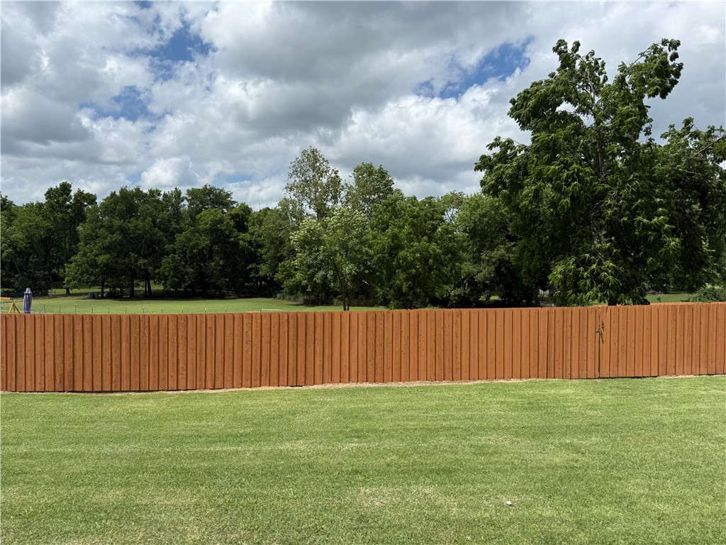 .84 acre lot located near JBU, walking trails, schools and everything Siloam Springs has to offer. Being offered as additional lot with 1045 W Garland MLS#1351756
Lot has been fenced with adjoining property and can/will be moved if not sold with adjoining property.
