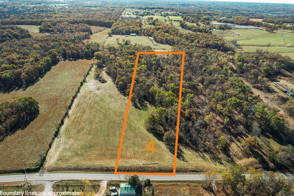 Last lot available! Excellent location to build your dream house with enough land for some livestock or horses. See photos/attached plat. (Note, photos were taken prior to homes built on other lots).