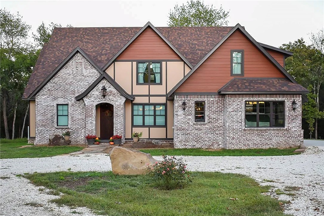 60-acre regenerative farm in Lincoln, AR, designed for rotational grazing, sustainable agriculture, and multi-generational living. Ideal for homesteaders, ranchers, or those seeking an income-producing rural property.
The custom Tuscan-inspired main home features 5 bedrooms + office, showcasing craftsmanship with hand-scraped hickory floors and forged iron details. Additional highlights include screened porch overlooking a creek, heated floors in the primary bath, in-ground tornado shelter, and energy-efficient construction.
Ideal for livestock with 30 ac of organic pasture, 30 ac woods, electric fencing, 13 water points, and 5 ponds.
Multiple building sites or income opportunities, including an 800 sqft barn-dominium under construction and 2 RV sites—perfect for Airbnb, tenants, or a multi-generational living. Also includes a 40x60 heated red-iron shop.  Near Fayetteville, this property offers privacy and functionality in Northwest Arkansas. Pre-qual or proof of funds required prior to showing.