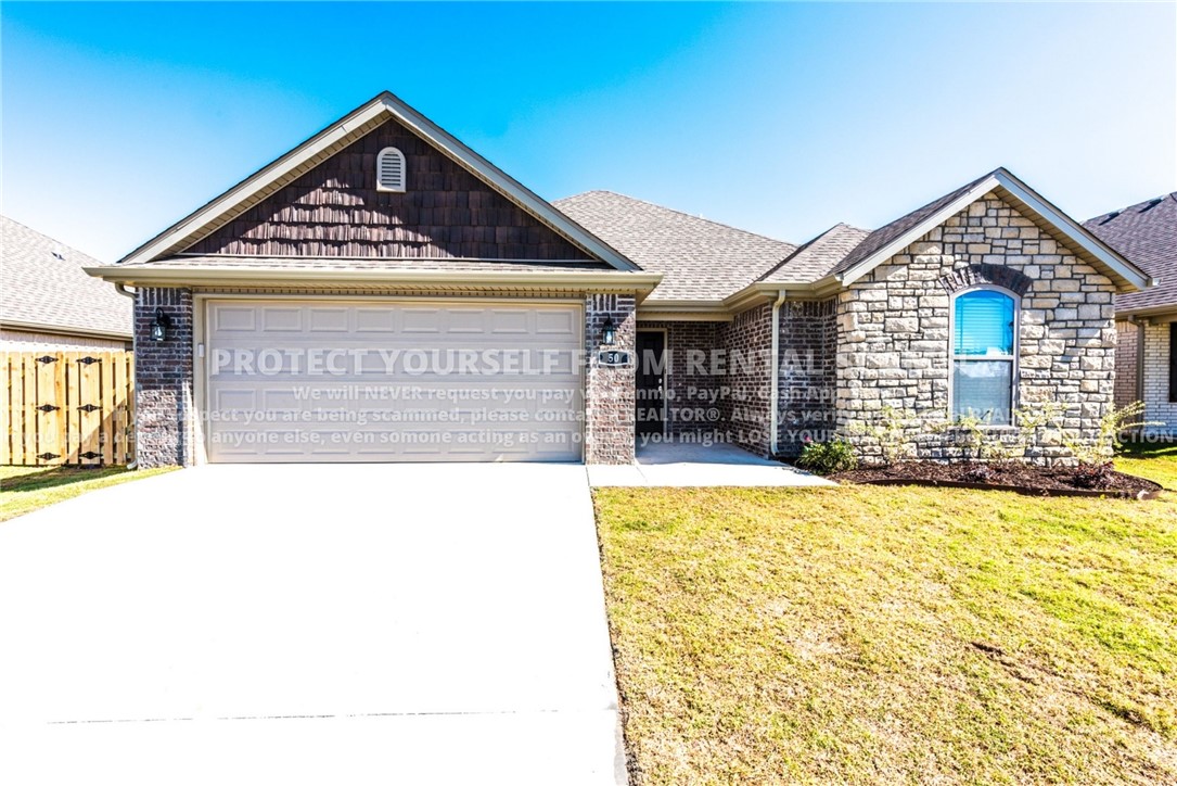 COMING SOON! Available approx. 8/4/26! Don't miss out on this beautiful 3 bedroom 2 bathroom home located just minutes from schools, parks, eateries, and a short drive to the University of Arkansas! This beautiful home features a spacious living room with wood-look tile flooring and a cozy gas-log fireplace, creating the perfect space to relax or entertain. The semi open-concept layout flows seamlessly into the stunning kitchen, complete with granite countertops, a breakfast bar, abundant cabinet storage, and a dedicated dining area. The private primary bedroom includes an en-suite bathroom with a double-sink vanity for added comfort and convenience. Outside, enjoy the fenced backyard, where a covered patio provides the ideal setting for outdoor dining, gatherings, or quiet evenings at home. *Available date may change. Property is tenant occupied - do not disturb the tenant. **Tenant is responsible for all utilities and lawn care/maintenance. *Pets Negotiable