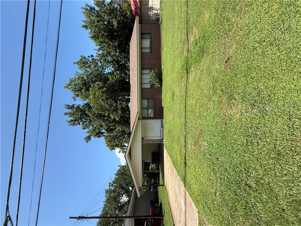 Welcome to this well-maintained 4-bedroom, 2-bath home offering 1,468± heated and cooled square feet of comfortable living space. Featuring numerous updates in recent years, this home is move-in ready and offers a functional floor plan with spacious living areas, an updated interior, and plenty of natural light. Situated on a 9,000± square foot lot, the property also includes a covered carport and a generous backyard with room to enjoy. Conveniently located near schools, shopping, dining, and other local amenities, this home is a great opportunity for a variety of buyers. Don't miss your chance to see all this property has to offer!