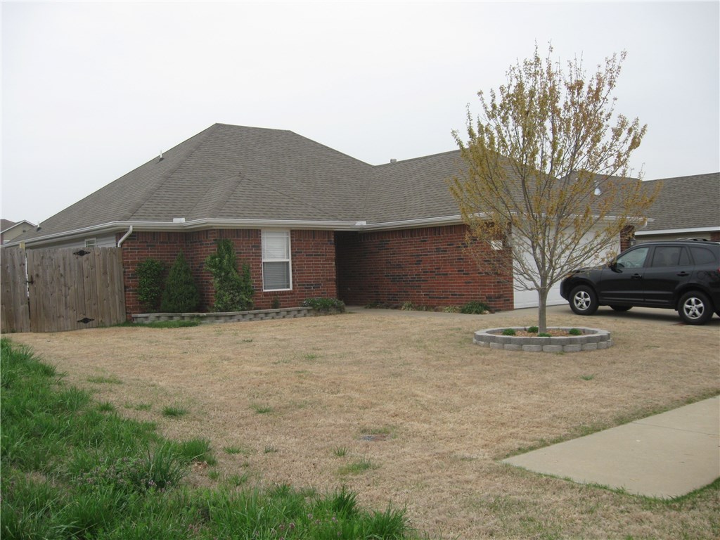 Nice 3 bed and 2 bath home in Rogers! House includes all appliances, gas log fireplace, and 2 car garage!
