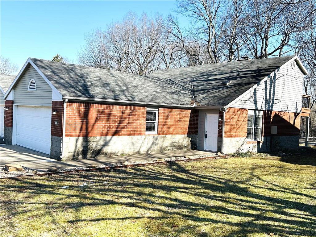 Lovely East Fayetteville condo within walking distance to Gulley Park, trails, restaurants and just a few miles from Lake Fayetteville, the University of Arkansas and the Entertainment District.  Inside, you will find a fully remodeled home, complete with fresh paint, new flooring, updated lighting and fresh fixtures throughout.  The kitchen has been modernized with quartz countertops, subway tile backsplash, and new stainless steel appliances. The first floor also features a large living and dining area, a downstairs master suite and an outdoor covered patio.  Upstairs you will find a second bedroom and bath and a versatile third room, perfect as a bedroom or office, with balcony views of the neighborhood park, trails, tennis courts and pool.  A renovation of the pool and tennis courts is already planned, adding even more value to this property. Enjoy carefree living while the Condo Association takes care of exterior maintenance, landscaping, insurance, neighborhood dues, and more.