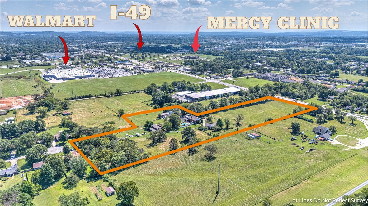 This remarkable 11.5-acre property offers exceptional commercial potential in a prime and growing corridor of Springdale. With expansive open fields, excellent visibility, and direct access from the roadway, this tract is well-suited for a variety of development opportunities. The land features wide, gently rolling acreage with a mix of open grassland and tree-lined edges, providing both versatility and natural appeal. With the property’s strong road frontage, multiple clear sightlines, and the depth of the parcel, highlighting how well it can accommodate large-scale commercial use. The setting combines ease of access with high visibility, making it ideal for retail, mixed-use, or professional developments. Surrounded by continued growth and positioned in a highly desirable area, this property provides both immediate utility and long-term investment value. Whether for a major commercial project or phased development, this 11.5-acre tract stands out as a rare opportunity in the expanding Springdale market