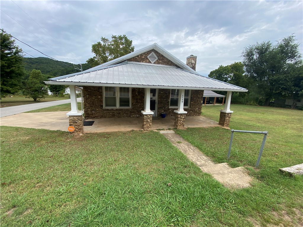 This 1215 SF medical office space is located in the quaint town of Jasper, Arkansas near the Little Buffalo River in the Ozark Mountains and Buffalo National River Region of Newton County Arkansas. Most recently been used as a Chiropractor facility with a large waiting area, receptionist area, two treatment rooms, break area, restroom and medical provider private offices. It can only be used as residential or used as a medical (including chiropractor) facility. This building is within walking distance to the historic Jasper Square (eating, shopping, services), Bradley Park (on the Little Buffalo River, pickle ball, swimming) and Jasper School (just across the street). Partial basement (with walkout & access from inside) perfect for a storm shelter and storage.  Newer HVAC, has a fireplace and maintains current termite policy. It is located in beautiful Newton County, Arkansas and near the Ozark National Forest. Also listed as residential MLS# 1319504.