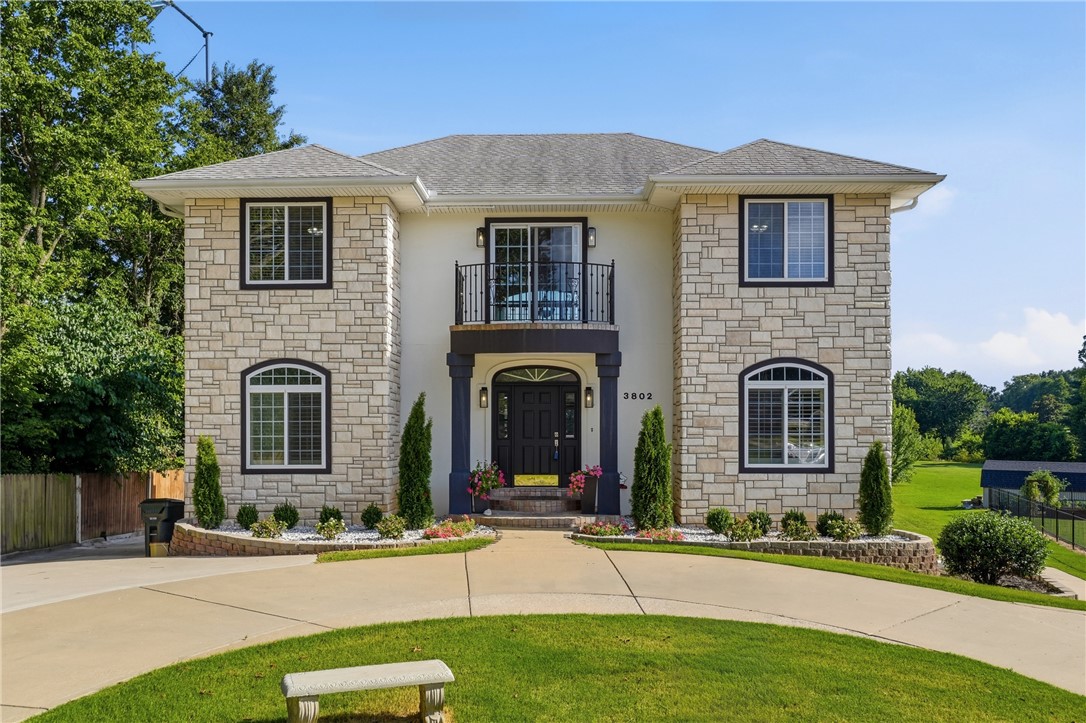 Beautifully updated +/- 3,592 SF home featuring 6 bedrooms and 4.5 bathrooms on +/- 2 private acres at the end of a cul-de-sac, offering the perfect combination of space, privacy, and convenience. This move-in ready home features fresh paint and new carpet throughout, updated kitchen countertops, and all new fixtures for a modern, refreshed feel. This house also has a new roof installed in 2019. The spacious floor plan includes a beautifully finished basement that provides additional living, entertainment, or recreation space, while the luxurious primary suite features an exceptional bathroom. The basement includes a dedicated storm shelter with extra thick walls. Step outside to enjoy the large back deck overlooking the expansive property, with a portion of the backyard enclosed by a privacy fence, or relax on the charming front balcony. Located directly adjacent to the Greenway trail, this property offers immediate access to walking, running, and biking while maintaining a peaceful setting on a generous lot.