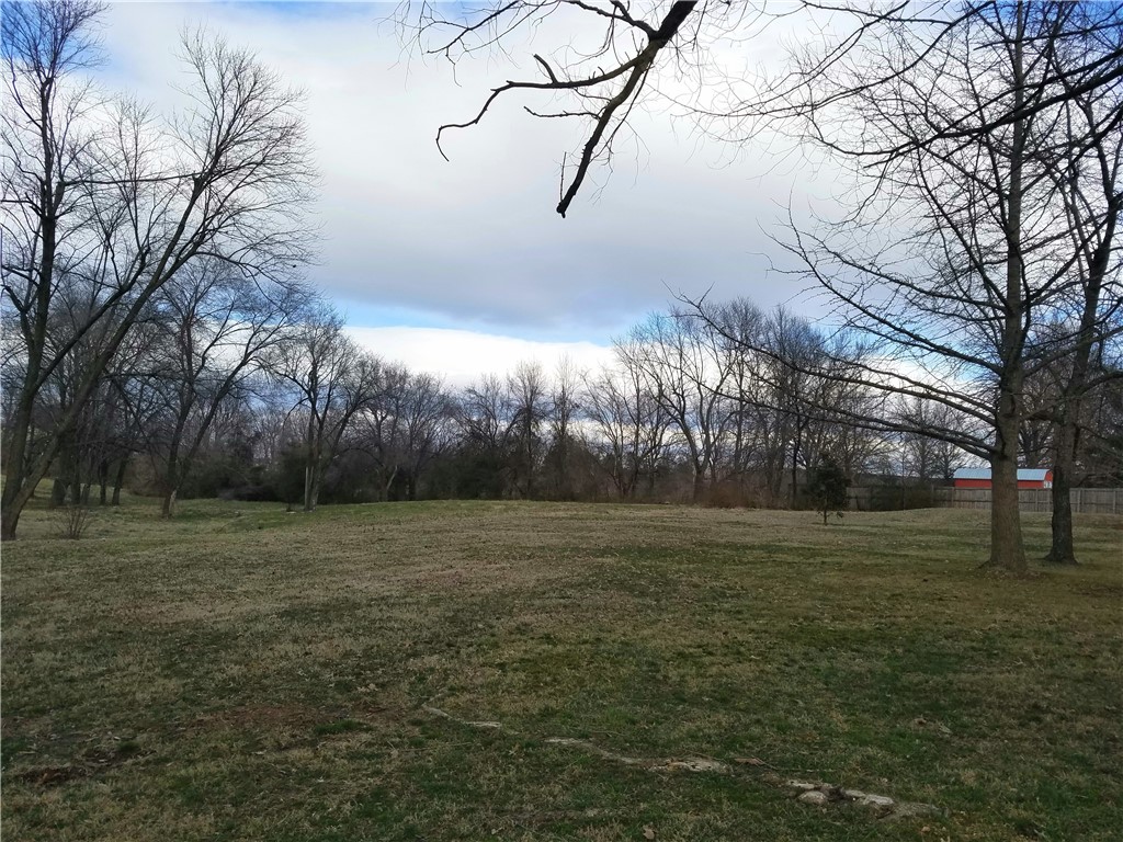 6.11 acres available for sale in the heart of Springdale. Ideal for a large estate home or even a small multi family development. All utilities on site. Building on site holds no value. Sold As-Is. Close to medical, restaurants, schools, shopping and downtown Springdale. Additional 0.71 acre contiguous parcel available separately with 2 bed 2 bath 1,770sf home. MLS #1201597
