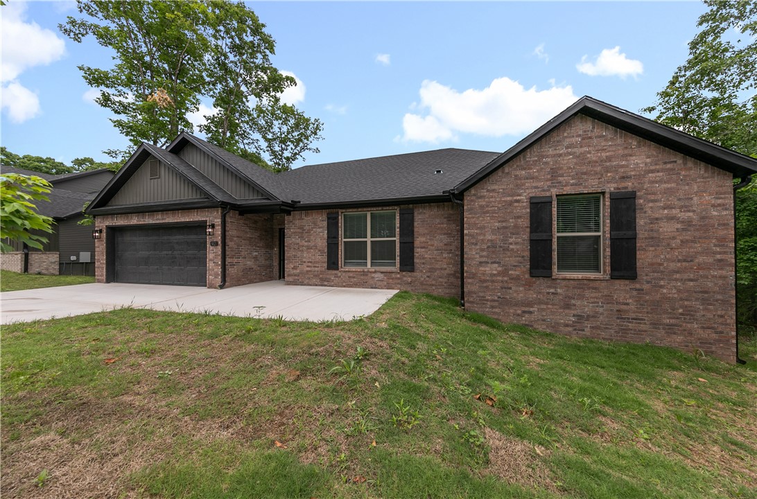 Welcome To Your Next Home At 3 Kent Drive! Bella Vista Flat Yard! This Brand-New Build Is Just Getting Underway Which Means You Still Have Time To Make Selections And Make It Completely Yours. Brick Front Exterior With Serious Curb Appeal Sets The Tone Before You Even Walk In. Inside, The Wide Open Living Area With Beam Accented 9 ft Ceiling, And Electric Fireplace Just Feels Right. The Kitchen Delivers Custom Cabinets, Quartz Or Granite Counters, Tile Backsplash, Under-Cabinet Lighting, A Pantry, Bar Seating, And Eat-In Dining... Because Life Happens In The Kitchen. The Primary Suite Features Beam Accents; Dual Vanity, Private Potty Closet, Full Custom Tile Shower, And A Walk-In Closet In Primary Bath. Two Add'l Room Plus A Full Hall Bath With Dual Vanity Round It Out Nicely. Storage Galore Throughout, A Covered Back Deck, And World-Class Mountain Bike Trails Close By. Bentonville Schools. Grab This One Now! **Deeded as a 2 bed septic. 3rd room to be considered bonus/office or nother non sleeping room.