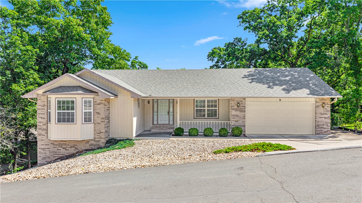 Welcome to one of Bella Vista's best-kept secrets — a beautifully maintained 3-bedroom, 3.5-bath ranch that checks every box! This 2,770 sq ft home sits on a professionally landscaped lot and features a cozy gas fireplace, split floor plan, walk-in closets, and a finished walk-out basement with workshop. The covered deck and patio are perfect for entertaining. You're just minutes from Loch Lomond Marina and the iconic Lakepoint Restaurant, making lakeside living effortlessly accessible. As a Bella Vista POA member, enjoy world-class amenities including pools, tennis courts, championship golf courses, fitness facilities, scenic trails, and multiple lakes. The attached 2-car garage, updated appliances, and architectural shingle roof add everyday convenience — all for a remarkably low monthly POA fee. This is the Bella Vista lifestyle at its finest. Don't miss this gem!