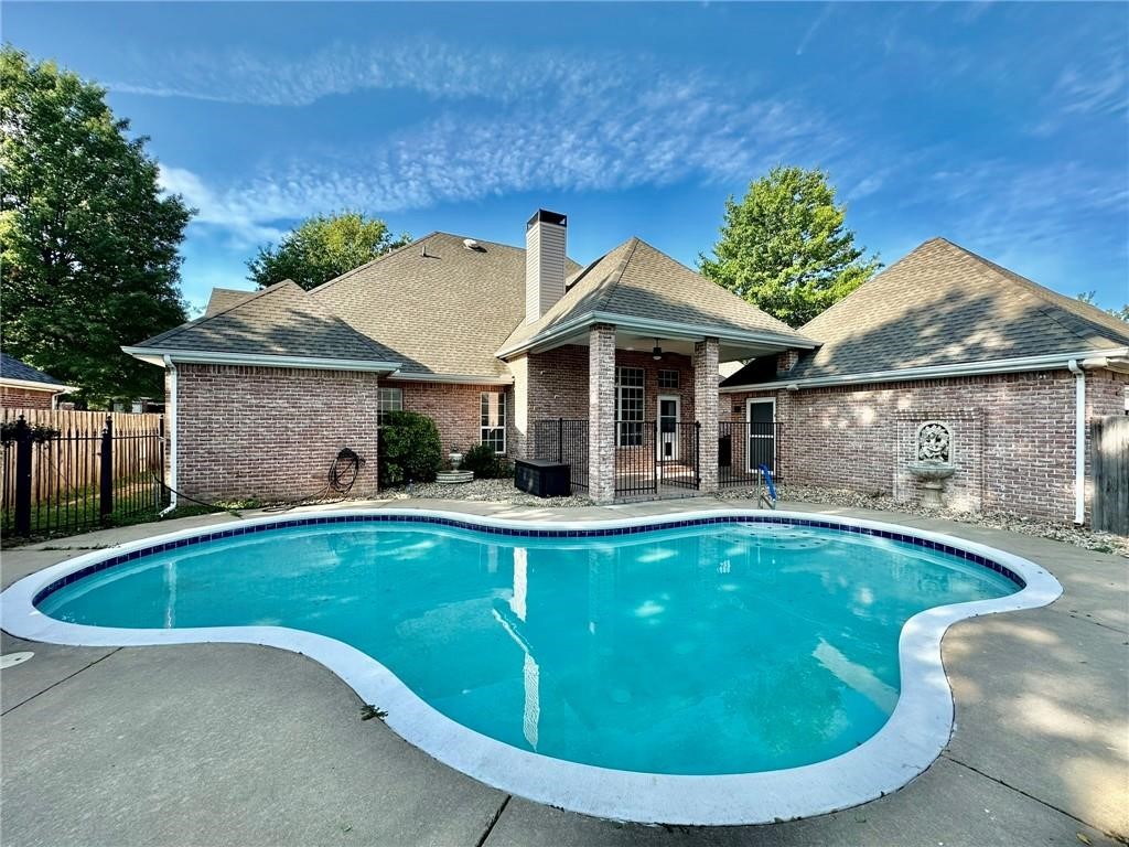 Perfect for those social gatherings! Beautiful pool maintained by the owner to free you up for all of the fun. Prime location near Pinnacle, restaurants, and Walmart Amp. Close to Mercy Trailhead bikeable to Neighborhood Market. Convenient to I49 and a park just a few streets away. Gorgeous large office with full wall built ins. Spacious kitchen with pantry and double ovens. No need to be concerned about storage, 2 separate 2 car garages! Call for a showing today!