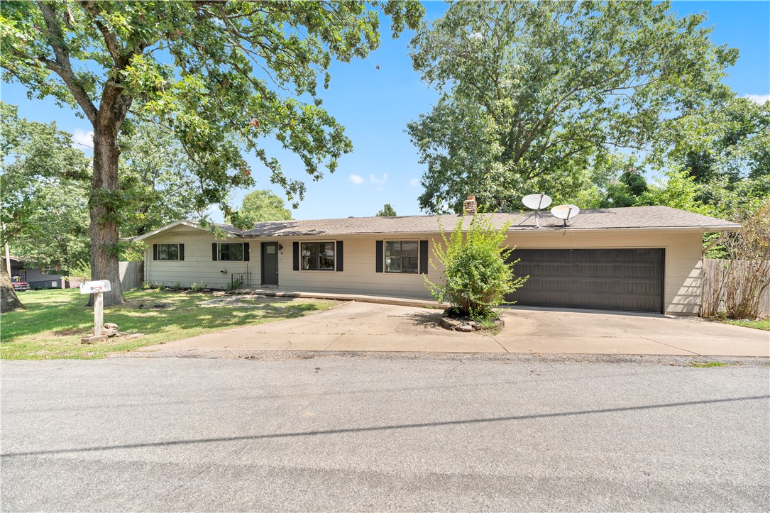 Welcome to 4 Enfield Drive—a beautifully remodeled Bella Vista home where modern updates meet the natural beauty of the Ozarks. The bright, refreshed interior features granite countertops, a spacious kitchen island, stylish backsplash, updated bathrooms, new ceiling fans, fresh paint, and contemporary flooring and fixtures throughout. The open kitchen and dining area offers an inviting space for everyday living and entertaining, with easy access to the back deck and peaceful wooded surroundings. Conveniently located near Bella Vista’s renowned golf courses, lakes, walking and mountain-biking trails—including the nearby Bamboozled Trail—and other community amenities. Enjoy a move-in-ready home with outdoor recreation and everything Northwest Arkansas has to offer close by. 
Schedule your private showing today!