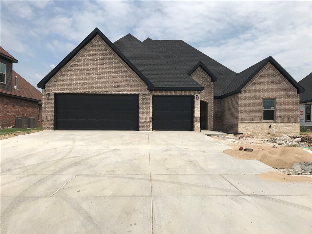 New Construction by RLP Investments. Spacious, 4 bedroom, 4 bath, 2 story home. Custom cabinets, granite counters, walking distance to schools, close to shopping and dining, easy access to I-49.